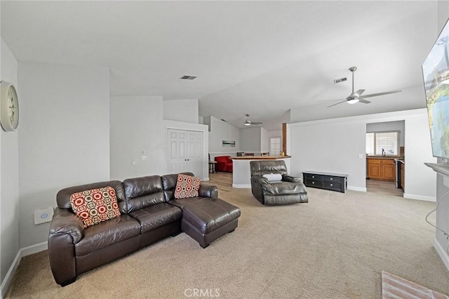 27175 Via Debra, Menifee, CA 92586 - living room with ceiling fan, light colored carpet, lofted ceiling, and baseboards