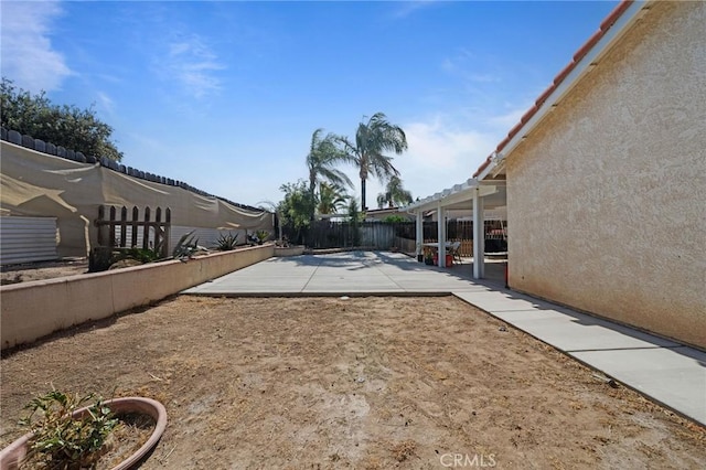 27175 Via Debra, Menifee, CA 92586 - fenced backyard featuring a patio area