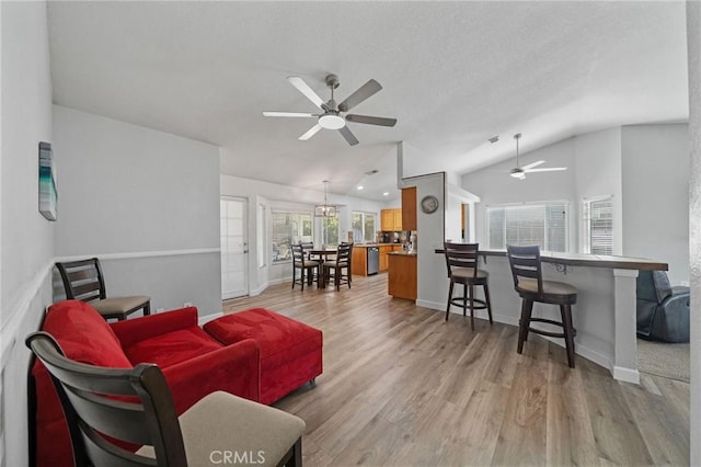 27175 Via Debra, Menifee, CA 92586 - living room with lofted ceiling, ceiling fan, light wood-type flooring, and baseboards