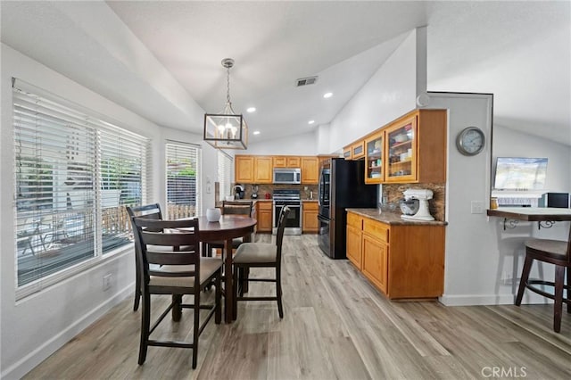 27175 Via Debra, Menifee, CA 92586 - dining space featuring light wood-style flooring, a chandelier, vaulted ceiling, baseboards, and recessed lighting