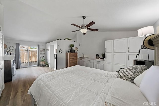 27175 Via Debra, Menifee, CA 92586 - bedroom with lofted ceiling, access to exterior, wood finished floors, an AC wall unit, and a ceiling fan