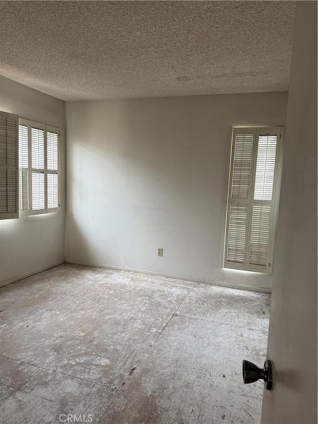9025 Willis Ave Unit 141, Panorama City, CA 91402 - unfurnished room featuring a textured ceiling