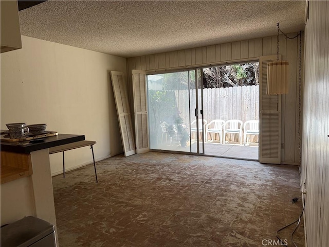 9025 Willis Ave Unit 141, Panorama City, CA 91402 - empty room with a textured ceiling