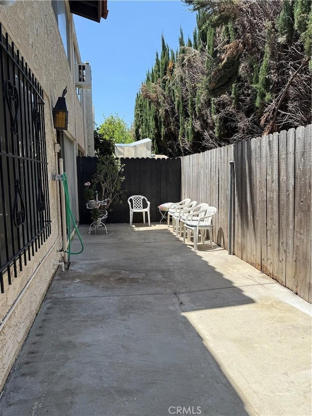 9025 Willis Ave Unit 141, Panorama City, CA 91402 - fenced backyard with a patio area