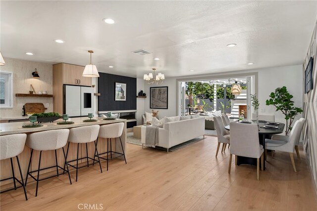 17174 Santa Madrina St, Fountain Valley, CA 92708 - dining area featuring a chandelier, light wood-type flooring, and recessed lighting