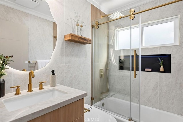17174 Santa Madrina St, Fountain Valley, CA 92708 - full bathroom with crown molding, tile walls, bath / shower combo with glass door, vanity, and toilet