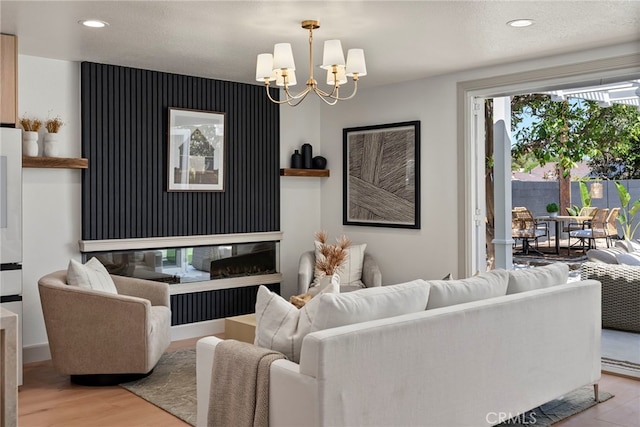 17174 Santa Madrina St, Fountain Valley, CA 92708 - living area featuring wood finished floors, a chandelier, and recessed lighting
