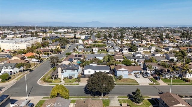 17174 Santa Madrina St, Fountain Valley, CA 92708 - aerial overview of property's location featuring mountains and nearby suburban area