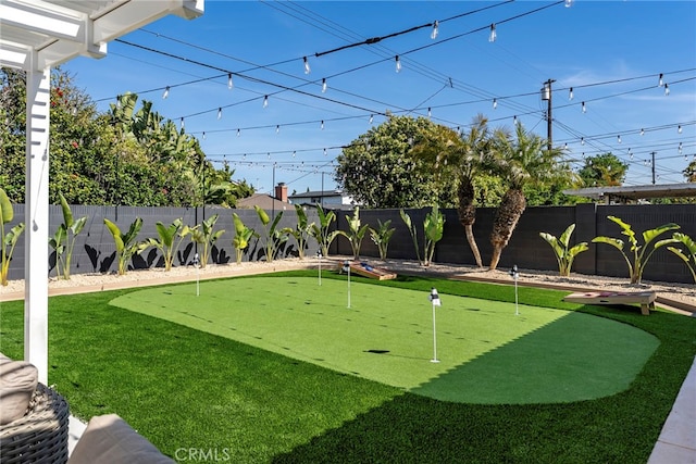 17174 Santa Madrina St, Fountain Valley, CA 92708 - fenced backyard with a putting area