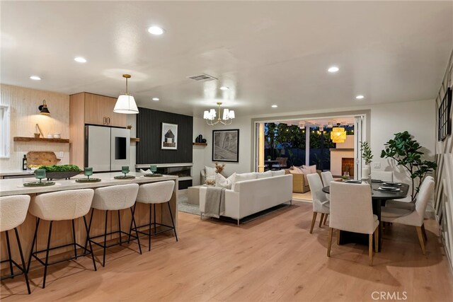17174 Santa Madrina St, Fountain Valley, CA 92708 - dining room featuring light wood-style flooring, recessed lighting, and a chandelier