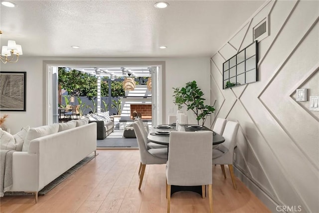 17174 Santa Madrina St, Fountain Valley, CA 92708 - dining area featuring a chandelier, light wood-style floors, and recessed lighting