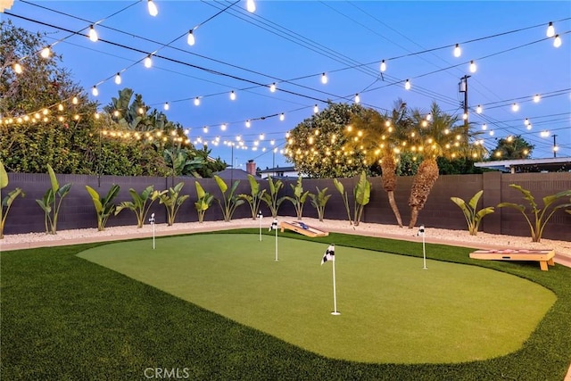 17174 Santa Madrina St, Fountain Valley, CA 92708 - view of home's community with an area to practice putting and a fenced backyard