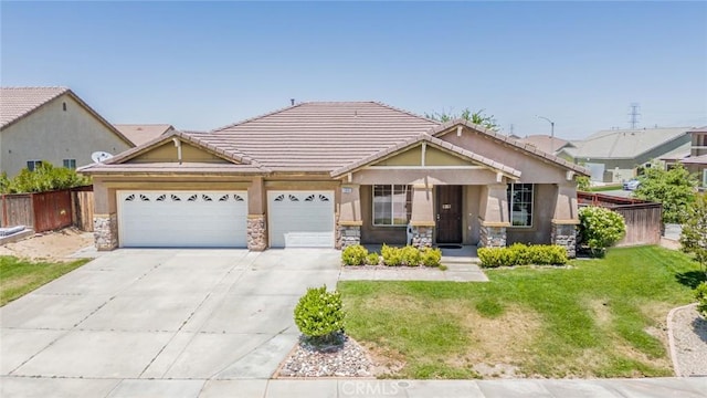 13932 Pinellia St, Hesperia, CA 92344 - view of front facade with driveway, a garage, stone siding, stucco siding, and a tiled roof
