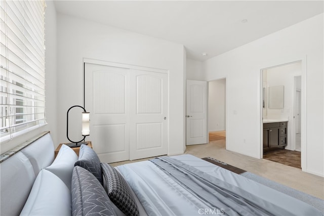 29604 Starring Ln, Menifee, CA 92584 - bedroom featuring light carpet, a closet, and ensuite bath