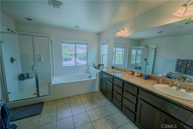 16540 Cadence Ln, Fontana, CA 92336 - bathroom featuring a garden tub, a stall shower, double vanity, and tile patterned flooring