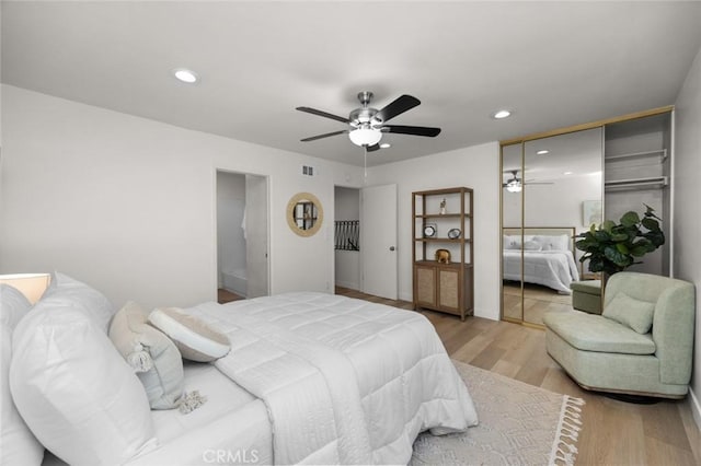 1881 Mitchell Ave Unit 114, Tustin, CA 92780 - bedroom featuring light wood-style flooring and recessed lighting