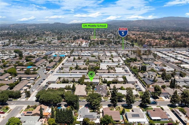 1881 Mitchell Ave Unit 114, Tustin, CA 92780 - aerial view of property and surrounding area featuring mountains and nearby suburban area