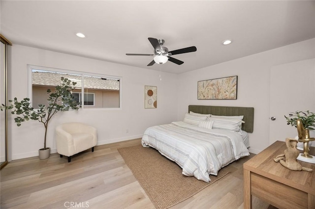 1881 Mitchell Ave Unit 114, Tustin, CA 92780 - bedroom with baseboards, light wood finished floors, recessed lighting, and ceiling fan
