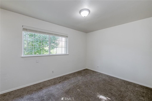 1542 E Alluvial Ave Unit 258, Fresno, CA 93720 - spare room featuring carpet and baseboards