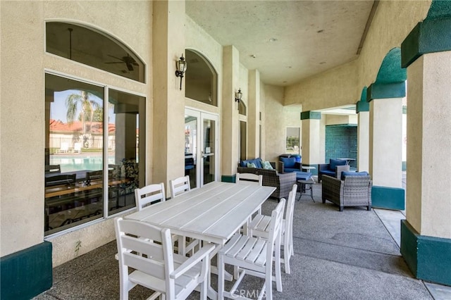 1542 E Alluvial Ave Unit 258, Fresno, CA 93720 - view of patio / terrace featuring an outdoor living space and french doors