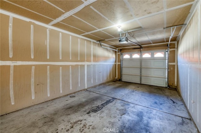 1542 E Alluvial Ave Unit 258, Fresno, CA 93720 - garage featuring a garage door opener