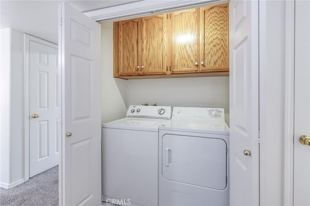 1542 E Alluvial Ave Unit 258, Fresno, CA 93720 - washroom featuring washing machine and clothes dryer, cabinet space, and carpet flooring