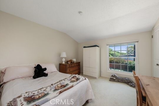 6741 Monero Dr, Rancho Palos Verdes, CA 90275 - bedroom with lofted ceiling and carpet