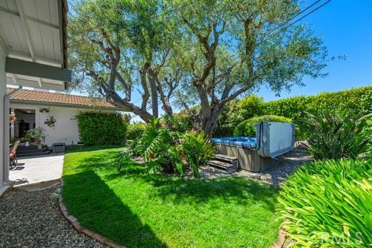 6741 Monero Dr, Rancho Palos Verdes, CA 90275 - view of green lawn with a hot tub