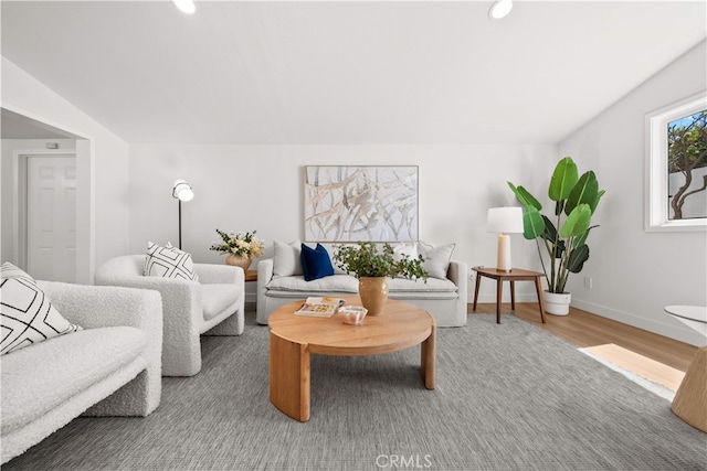 12391 Beck Ave, Garden Grove, CA 92840 - living room with wood finished floors, baseboards, and recessed lighting