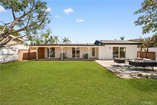 12391 Beck Ave, Garden Grove, CA 92840 - back of house featuring a patio, stucco siding, an outdoor living space, and central AC