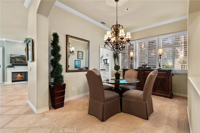 1444 Upland Hills Dr N, Upland, CA 91784 - dining area featuring a chandelier, crown molding, baseboards, a glass covered fireplace, and arched walkways