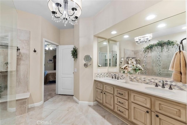 1444 Upland Hills Dr N, Upland, CA 91784 - ensuite bathroom featuring a chandelier, double vanity, tiled shower, baseboards, and recessed lighting