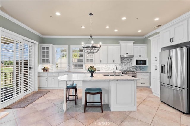 1444 Upland Hills Dr N, Upland, CA 91784 - kitchen featuring appliances with stainless steel finishes, a sink, plenty of natural light, decorative backsplash, and crown molding