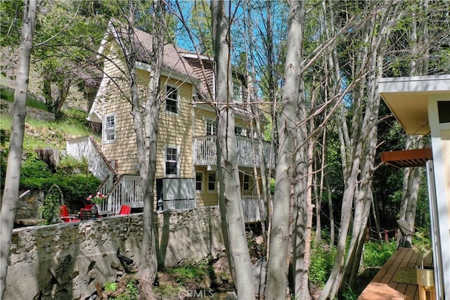 29613 Hook Creek Rd, Cedar Glen, CA 92321 - view of property exterior with a balcony and stairs