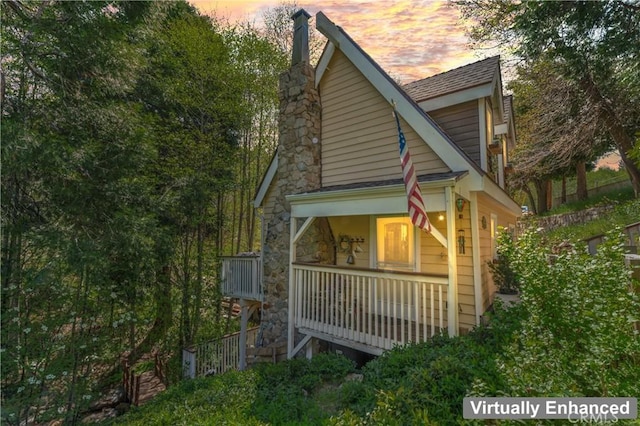 29613 Hook Creek Rd, Cedar Glen, CA 92321 - property exterior at dusk featuring covered porch and a chimney