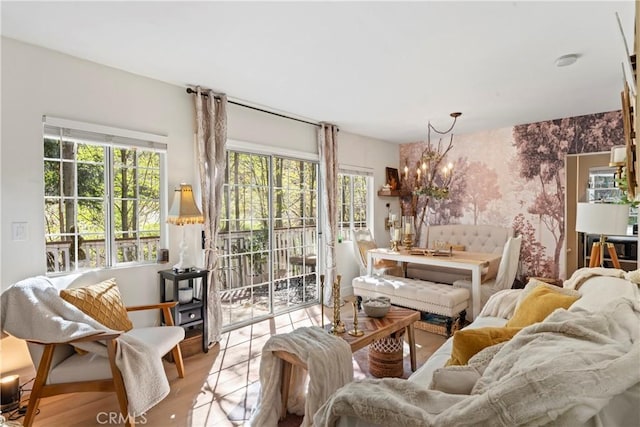 29613 Hook Creek Rd, Cedar Glen, CA 92321 - living area with wallpapered walls, a chandelier, wood finished floors, and an accent wall