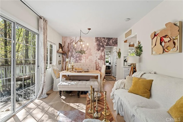 29613 Hook Creek Rd, Cedar Glen, CA 92321 - living area featuring a chandelier and wood finished floors