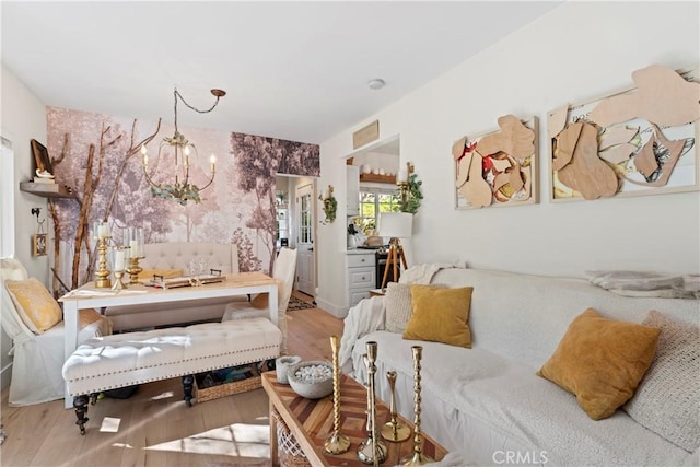 29613 Hook Creek Rd, Cedar Glen, CA 92321 - living room featuring a chandelier and wood finished floors
