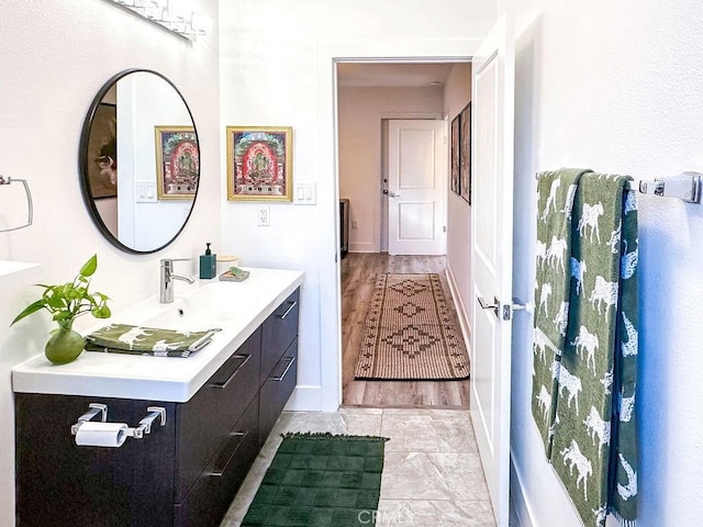 1927 W 84th Pl, Los Angeles, CA 90047 - bathroom featuring vanity and baseboards