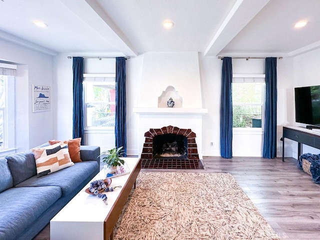 1927 W 84th Pl, Los Angeles, CA 90047 - living room featuring plenty of natural light, wood finished floors, recessed lighting, a fireplace, and beamed ceiling