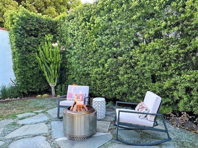 1927 W 84th Pl, Los Angeles, CA 90047 - view of patio with an outdoor fire pit