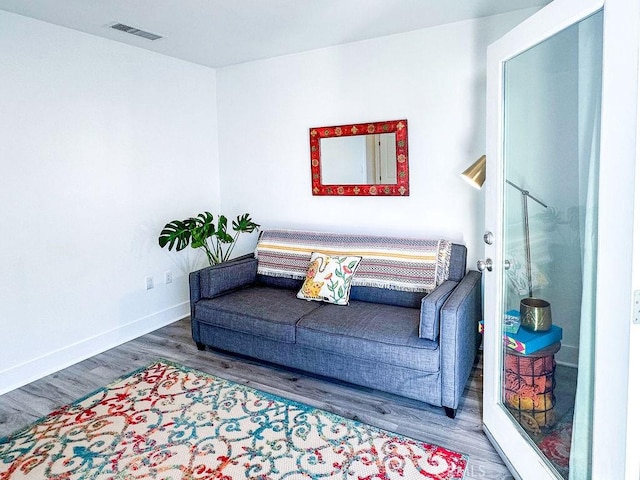 1927 W 84th Pl, Los Angeles, CA 90047 - living room featuring wood finished floors and baseboards
