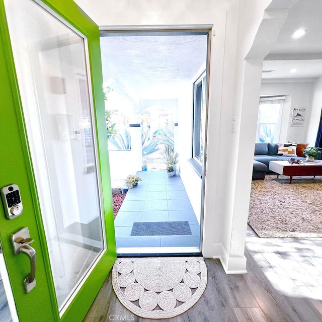 1927 W 84th Pl, Los Angeles, CA 90047 - foyer entrance featuring wood finished floors, baseboards, and recessed lighting