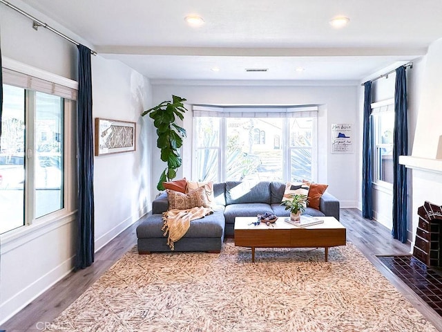 1927 W 84th Pl, Los Angeles, CA 90047 - living area featuring plenty of natural light, wood finished floors, baseboards, and recessed lighting