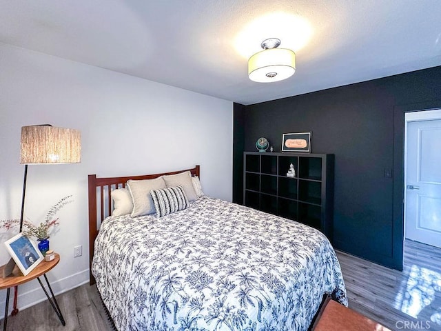 1927 W 84th Pl, Los Angeles, CA 90047 - bedroom with wood finished floors and baseboards