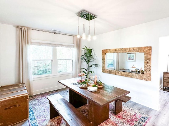 1927 W 84th Pl, Los Angeles, CA 90047 - dining area featuring baseboards and wood finished floors