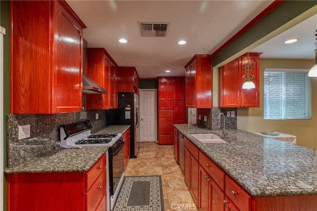 10049 Langdon, Mission Hills San Fernando, CA 91345 - kitchen with stainless steel appliances, recessed lighting, backsplash, wall chimney exhaust hood, and reddish brown cabinets