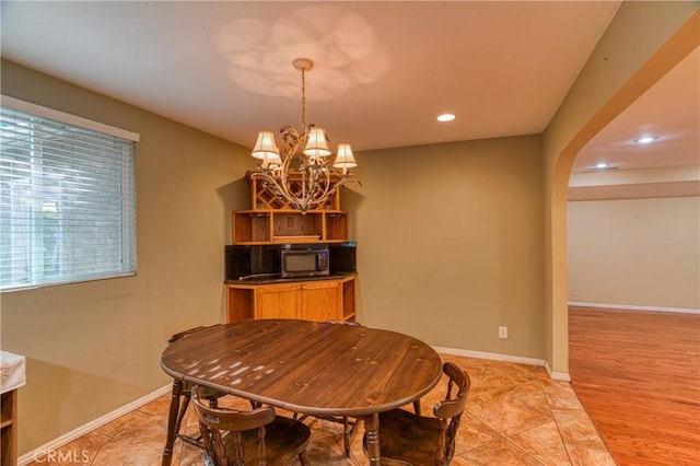 10049 Langdon, Mission Hills San Fernando, CA 91345 - dining area featuring a chandelier, recessed lighting, and arched walkways