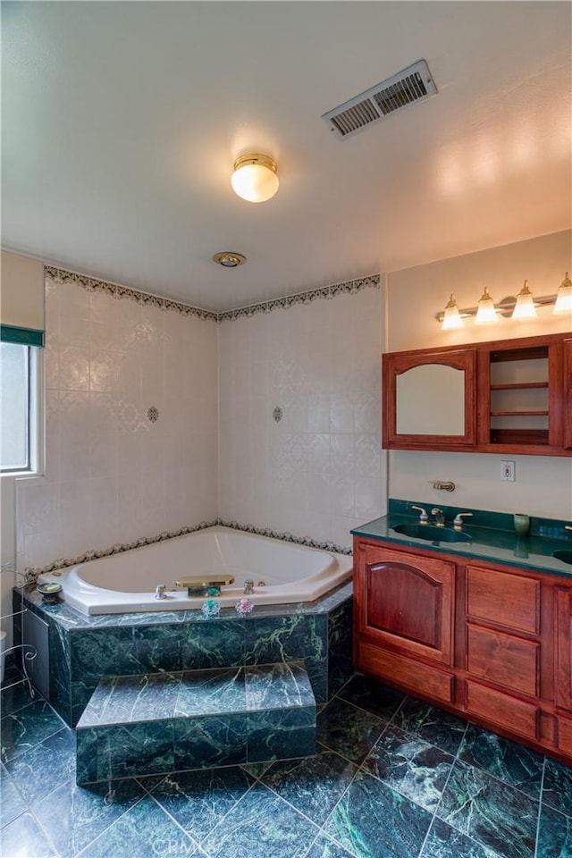 10049 Langdon, Mission Hills San Fernando, CA 91345 - bathroom featuring vanity, a bath, and marble finish floors
