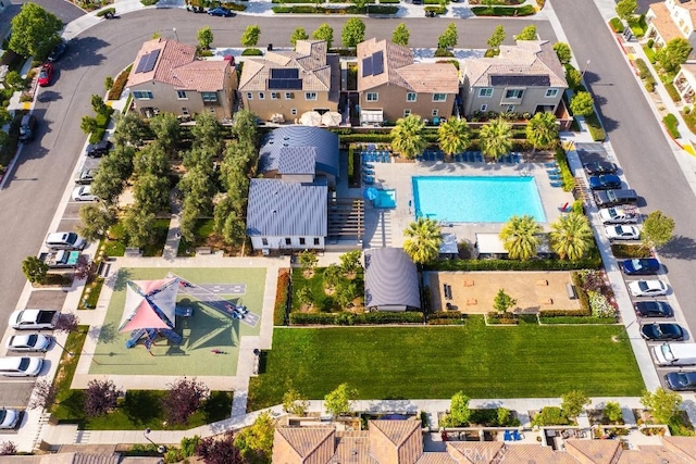 16075 Osprey Ave, Chino, CA 91708 - aerial perspective of suburban area featuring a pool